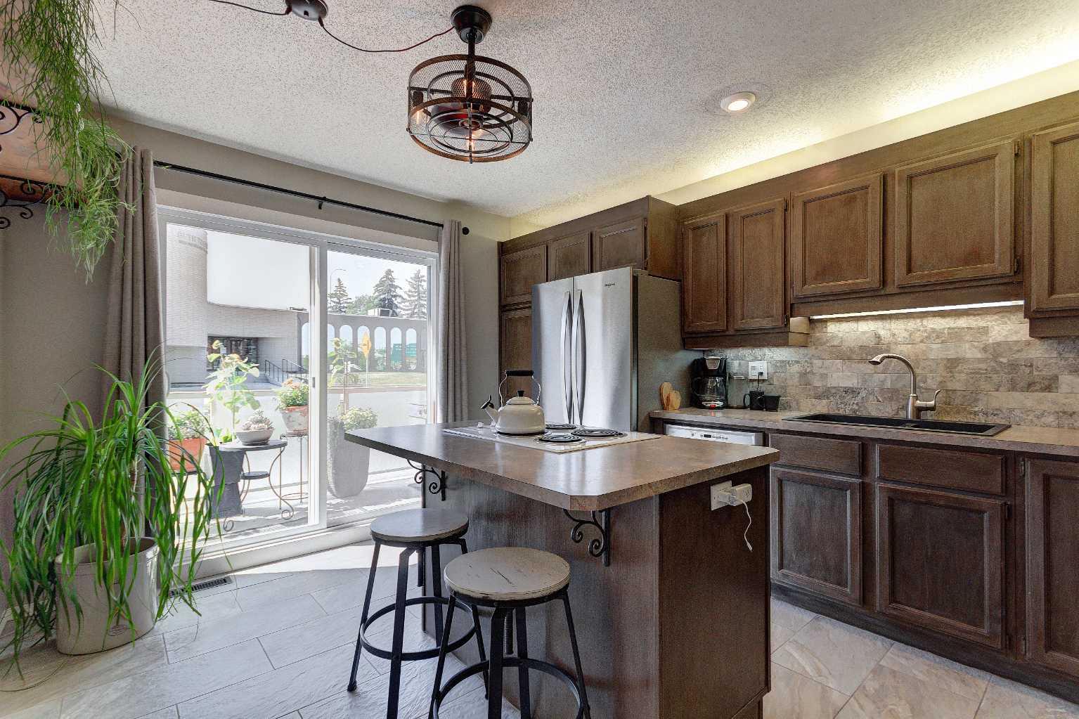 103, 1305 Glenmore Trail SW