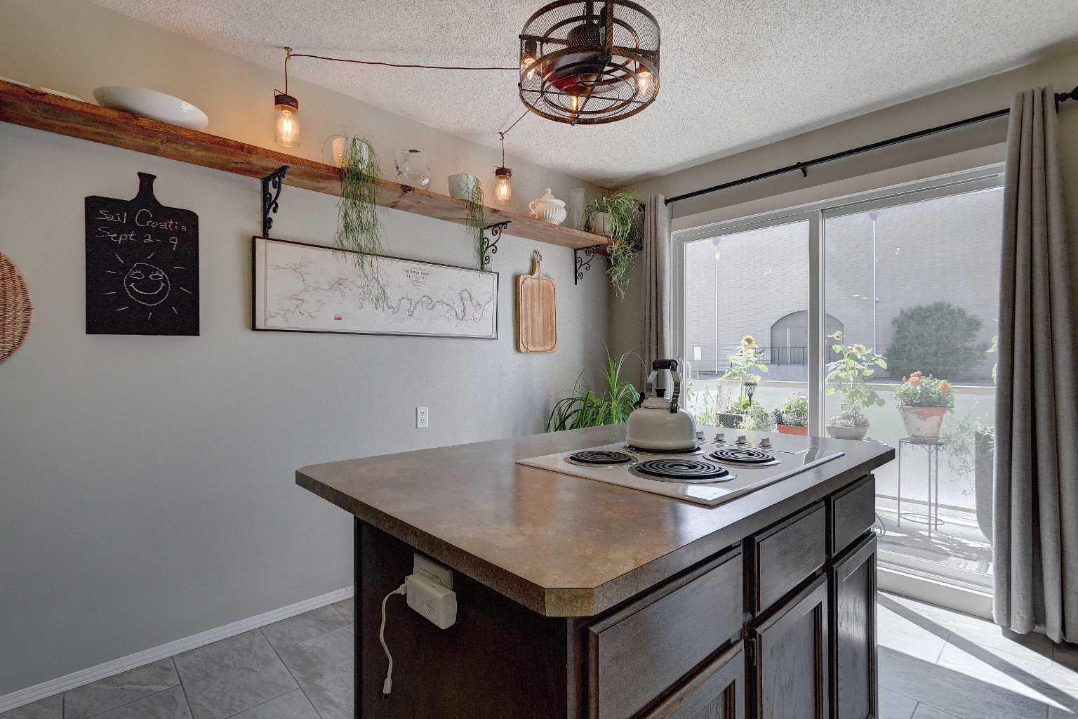 103, 1305 Glenmore Trail SW