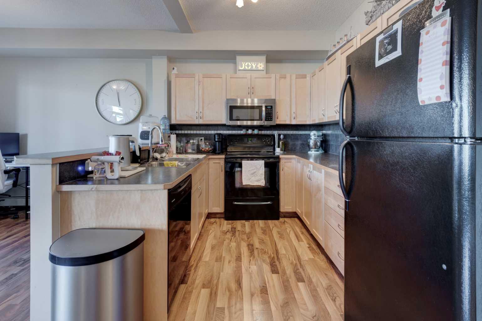 1203, 211 Aspen Stone Boulevard SW