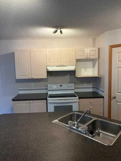 140 Tuscany Ridge View NW