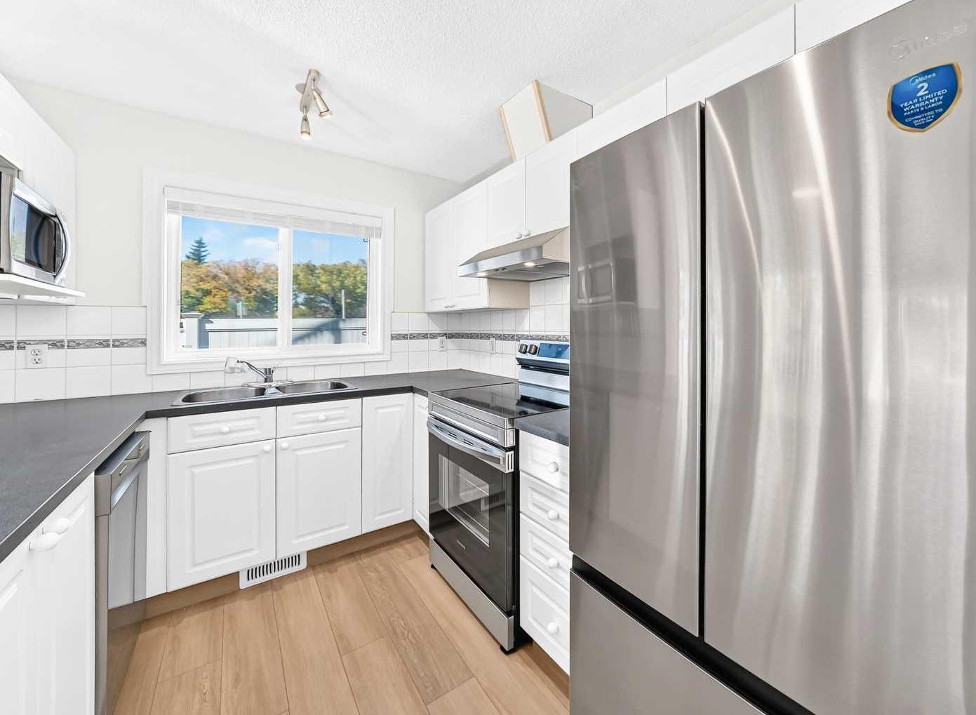103, 7 Harvest Gold Manor NE